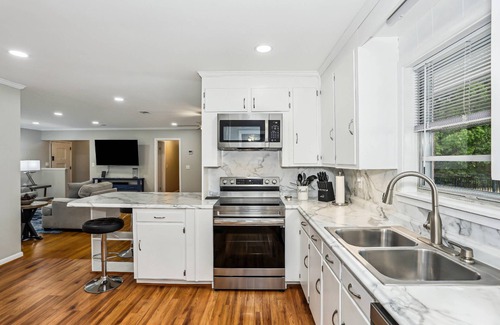 Northeast Pensacola House | Brand New Private Pool | Huge Open Lot |Corn Hole and Volleyball |Convenient to Airport and Shopping