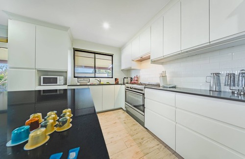 Waikiki House | Bright Airy Retreat with Garden