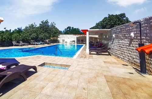 Lopar Apartment | Bright and inviting holiday apartment with inviting communal pool near the beach!