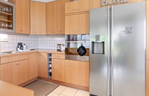 Domdidier House | Bright architect-designed villa with private garden