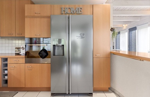 Domdidier House | Bright architect-designed villa with private garden