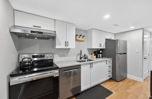 Kingston House | Bright & Modern 2BR Basement Suite w/Rustic Bar & Private Entrance