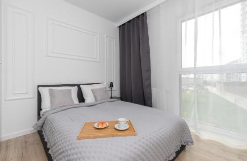Nowy Port Apartment | Bright & Modern Apartment with Parking near Arena Gdansk by Noclegi Renters