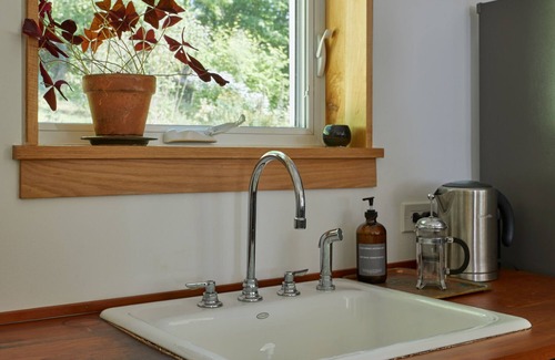 Nelsonville Apartment | Bright/modern escape : nestled in the forest, walk to the village & train