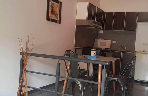 Moreno Apartment | brown apartment complex