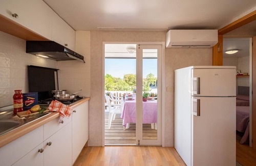 Puntone House | Bungalow with pool in a park-like garden by the sea!