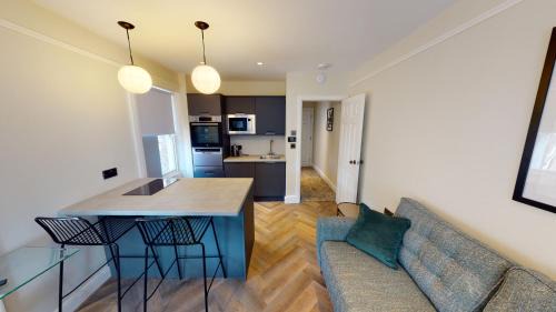 Hope Street Apartment | By Cathedral Kitchen Island Tv Wd Access
