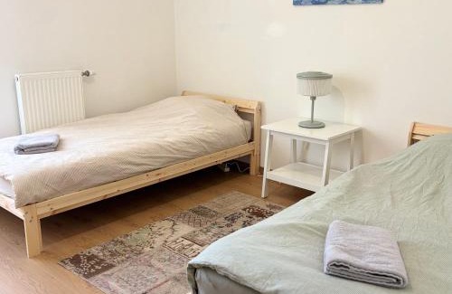 Parilly Apartment | Côté Parc - appt cosy et neuf, parking & au pied du métro à Lyon