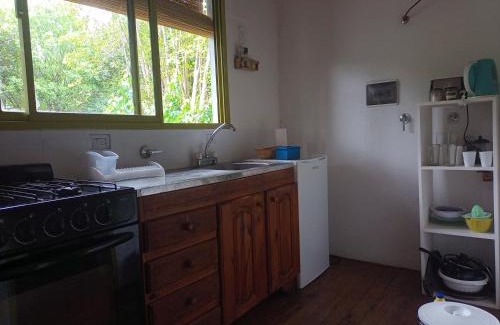 Villa Elisa Apartment | Cabaña monoambiente con pileta y jardín arbolado