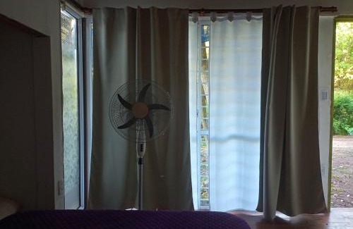 Villa Elisa Apartment | Cabaña monoambiente con pileta y jardín arbolado