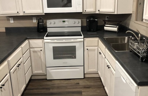 Marianna Cabin | Cabin with 40 ft porch overlooking a pond.