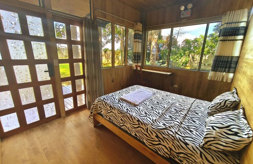 Iquitos Bed & Breakfast | Cabins and lake, abundant vegetation and wildlife in the heart of downtown Iquitos
