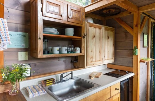 Johnson House | Caboose Tiny Home on river with hot tub near Stowe