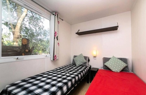 Nefiach House | Campsite La Garenne*** - Comfort mobile home 3 rooms 4/6 people Semi-covered terrace