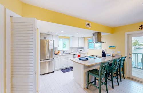 Key Colony Beach House | Canal-front home with Cabana Club access, water view, & private W/D