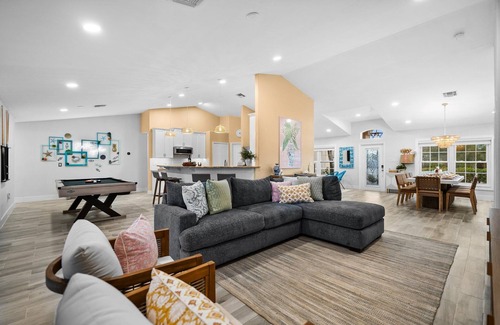 Pelican Villa | Canal-Front Oasis: Pool, Games, EV Charger