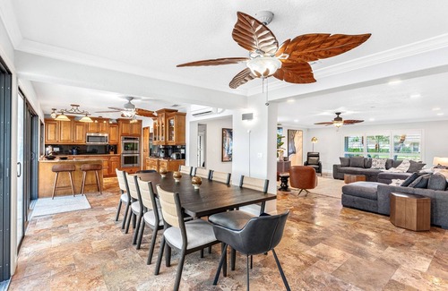Cocoa Isles House | CanalFront | Heated Pool + Game Room w/Pool Table