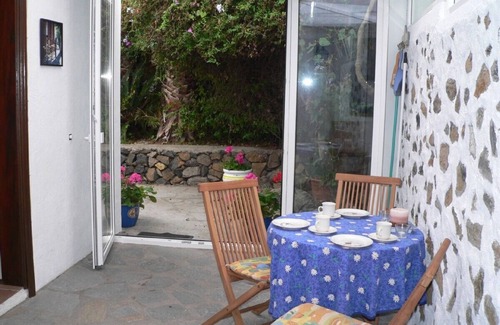 El Paso House | Canary Island style house with stone walls, surrounded by a terrace
