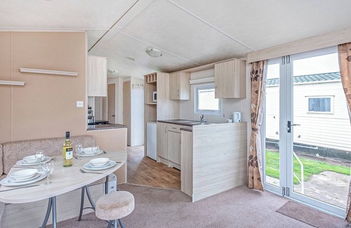 Prestatyn House | Caravan with one double and two twin.