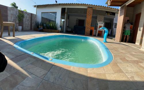 Palhoca House | Casa com piscina próximo à praia