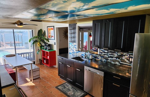 St. Petersburg - Clearwater House | Casa Dolphina: 6BR Waterfront Mini-Resort—Pool & Spa, Sunsets, Dock, St. Pete FL