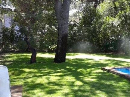 Monte Hermoso House | Casa en barrio Las Dunas con pileta climatizada y parrilla