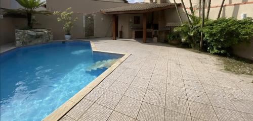 Enseada House | Casa Guarujá Pé na Areia praia Enseada