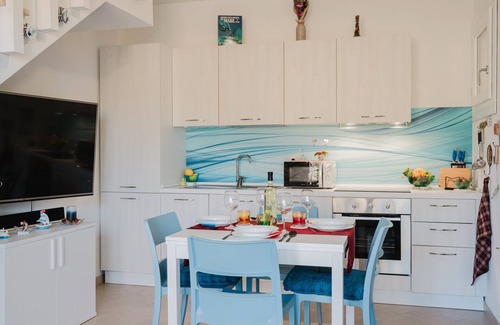 Viddalba Apartment | Casa Lidia, with Shared Pool, Private Parking and Garden; Bouganville Residence in Viddalba