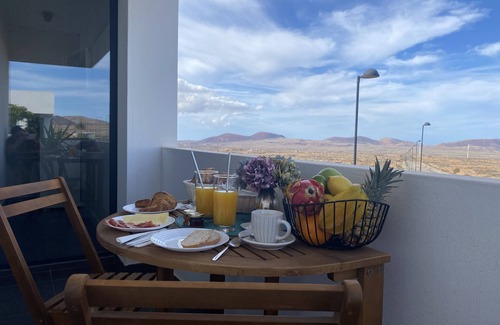 La Oliva Apartment | CASA MAGMA: apartment with roof terrace, private Jacuzzi, ocean & volcano views