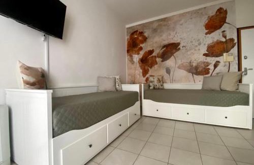 Borgo Dora Apartment | Casa Noè - cozy home with big terrace and private box