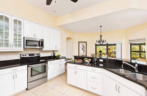 Cape Coral Villa | Casa Nueva Waterfront w/Heated Pool/Spa + Tiki