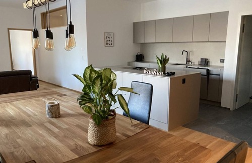 Laax Apartment | "Casa Riva" holiday flat with mountain and lake views