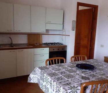 Aglientu House | casa rosa nel residence mirice con piscina ,wifi,climatizzatore - vicino al mare