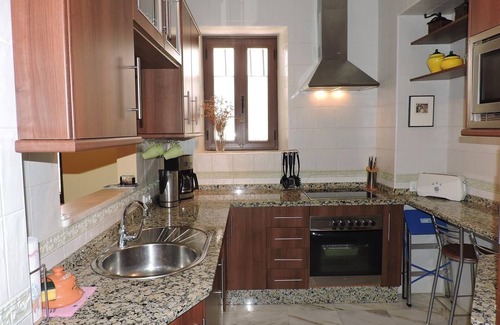 San Bartolome House | Casa Sevillana with Open Terrace, Balcony, Air Conditioning, Heating and Wi-Fi