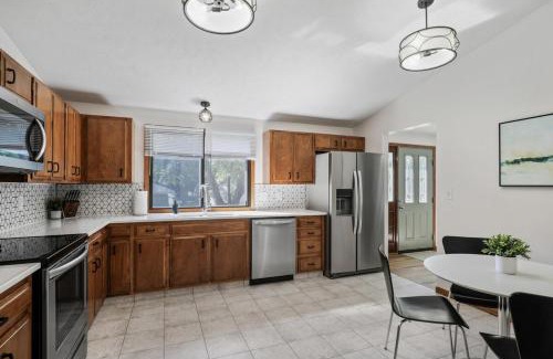 West Omaha House | Central Location - 2 living spaces & covered patio!