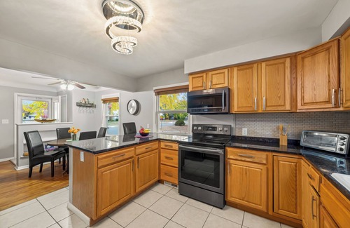 Brooklyn Center House | Centrally Located Cozy Home W/Game & Yoga Rooms