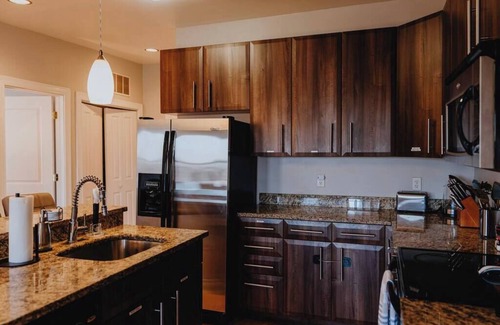 The Gate Apartment | Charming 1BR Retreat Opposite SSM SLU Hospital with Private Parking & Balcony