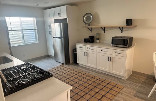 Tooele Apartment | Charming 2-bedroom basement apartment with WiFi, AC in lovely Stansbury Park