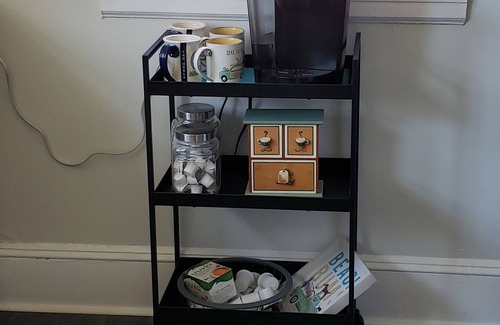 East Spencer House | Charming 2-bedroom vintage cottage with WiFi, a/c, and other popular amenities.