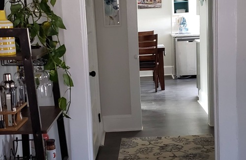 East Spencer House | Charming 2-bedroom vintage cottage with WiFi, a/c, and other popular amenities.