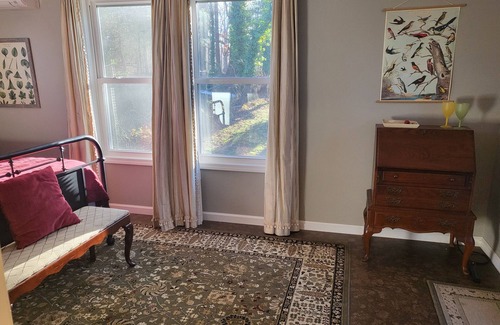 Bear Creek House | Charming bedroom and bath with private entrance and screened porch .