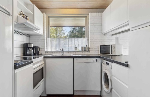 Udbyhøj House | Charming brick house with sauna and fjord view