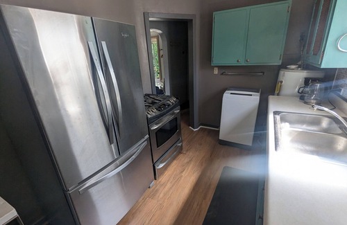 City Park West Cottage | Charming Carriage House w/Private Yard and Entrance