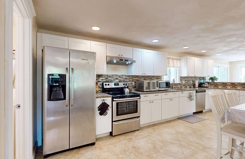 Buzzards Bay House | Charming coastal home with sunny rooms, private backyard, & walk to beach