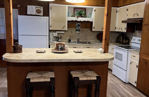 Cherokee Other | Charming country home, game room, pond, gazebo and peaceful sounds of windmill.