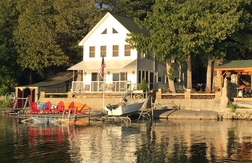Traverse City Cottage | Charming, cozy cottage 10 feet from water's edge on Lake Leelanau.