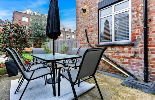 Clapton Apartment | Charming Family Abode: Beautiful Home with Outdoor Space