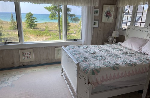 Menonaqua Beach Cottage | Charming Harbor Springs cottage right on the sandy beach and crystal water