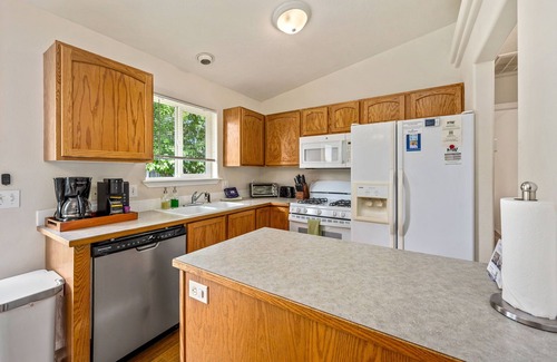 Coeur d'Alene House | Charming Home—Near Triple Play, Silverwood & Hayden Lake! Fire Pit, Fenced Yard & a Plum Tree!