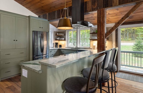 Warren Condo | Charming Sugarbush Farmhouse Condo with Hot Tub Oasis